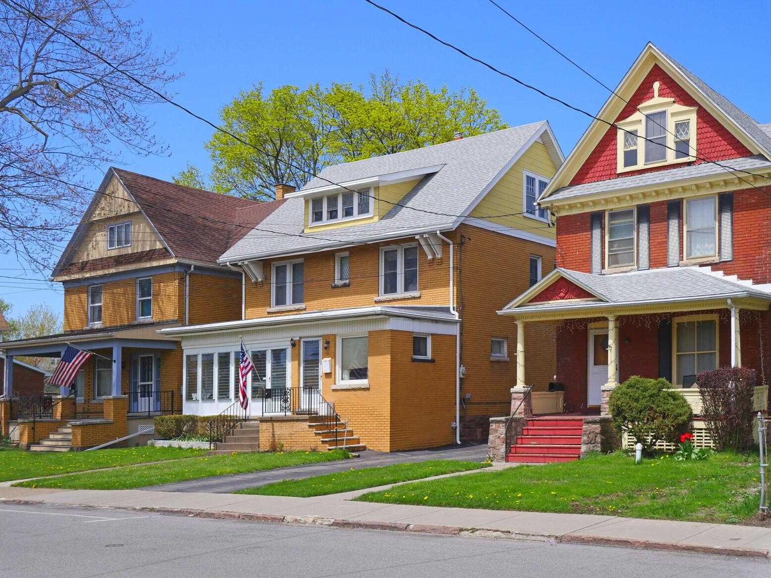 A well-maintained older home pictured from the outside